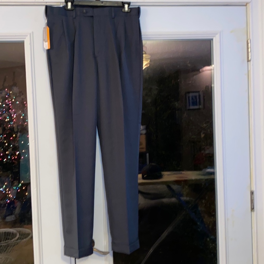 Savane straight fit, wrinkle resistant dress slacks. Size 34x32. New with tags.